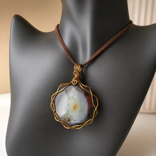 blue and white agate wire wrapped pendant on cord