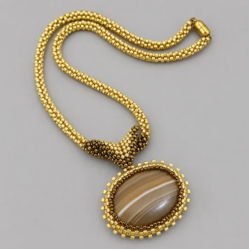 brown banded agate oval pendant on gold seed bead rope