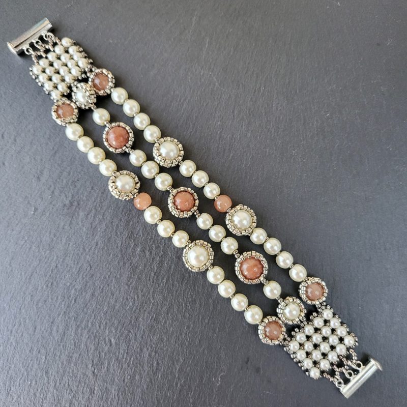 Three strand white glass pearl and brown agate bracelet