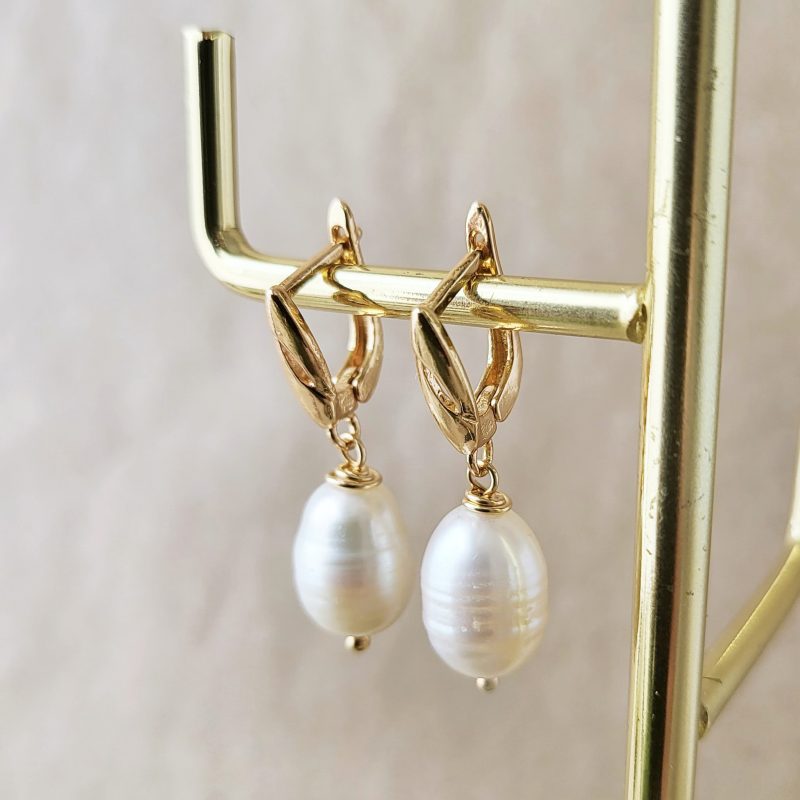 White freshwater drop earrings with gold fastenings
