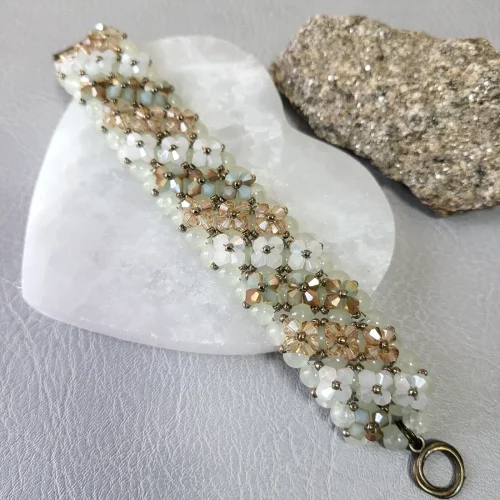 pale green, white, and champagne tone bicone beaded wide bracelet (1) xnc 1